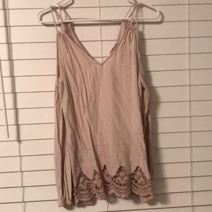 Light pink top with cut-out shoulders